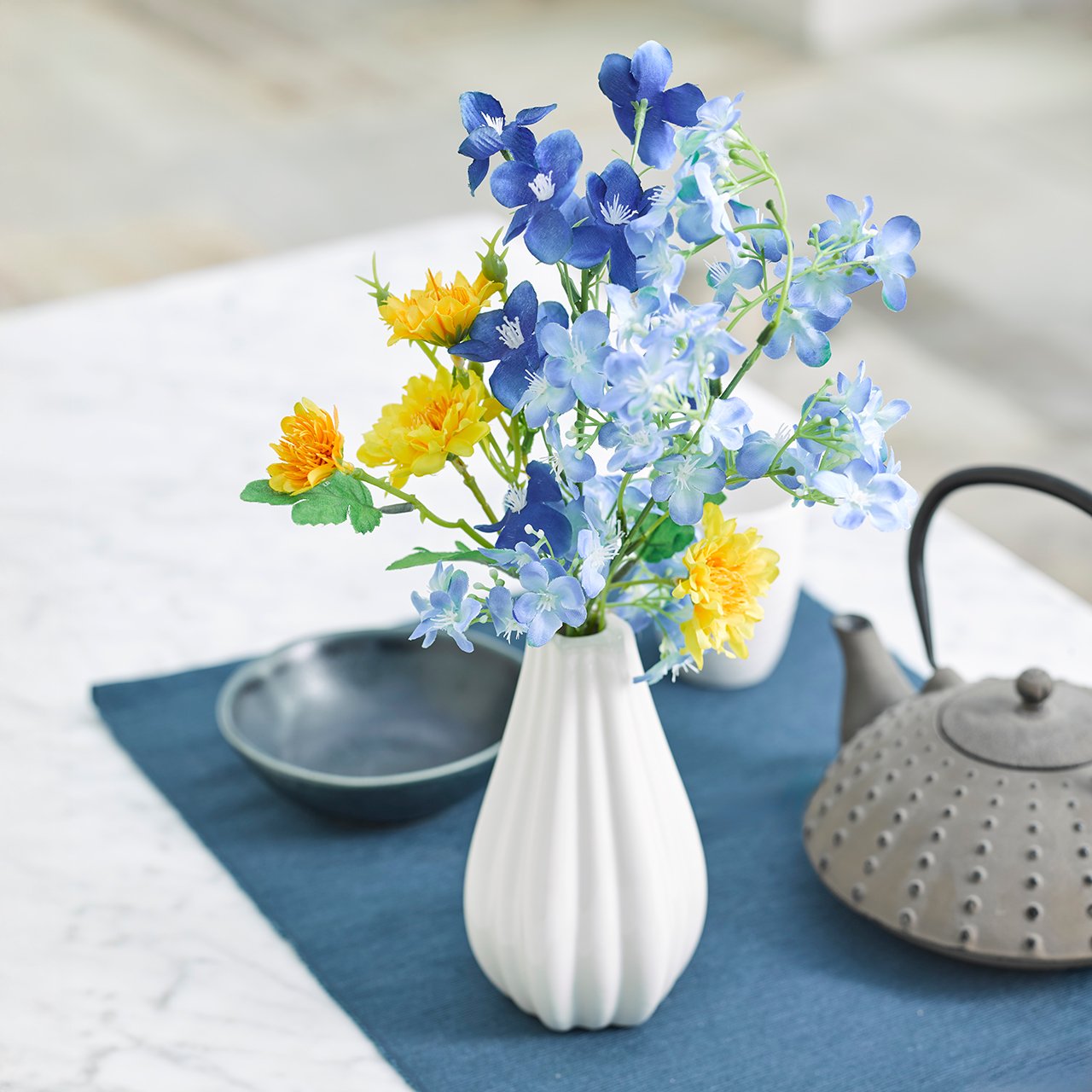 Star Blossom and Delphinium Arrangement