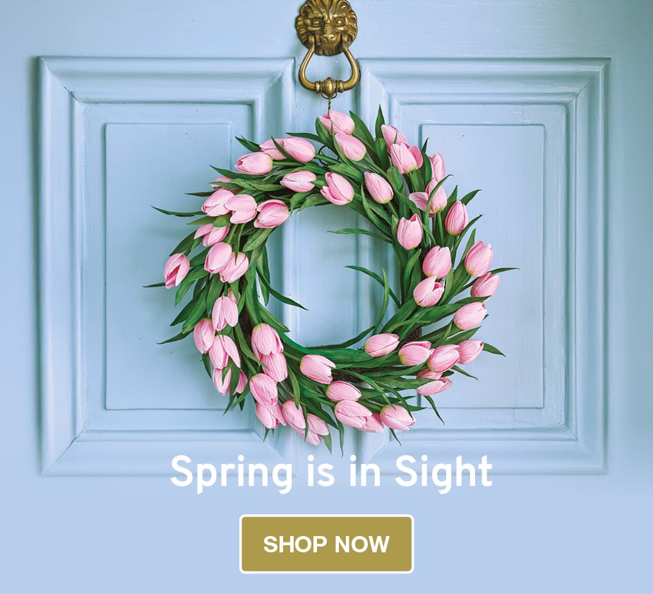 Image of faux pink tulip wreath on blue door