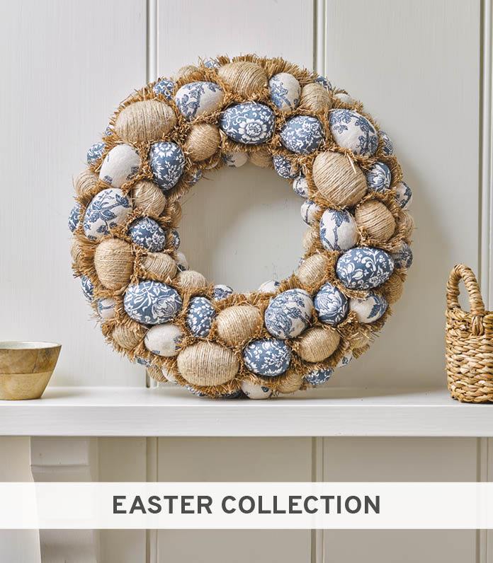 Faux egg wreath made up of blue and cream patterned eggs