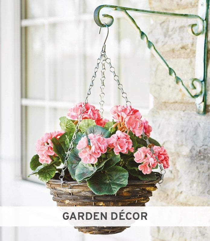 Hanging basket filled with faux pink geraniums